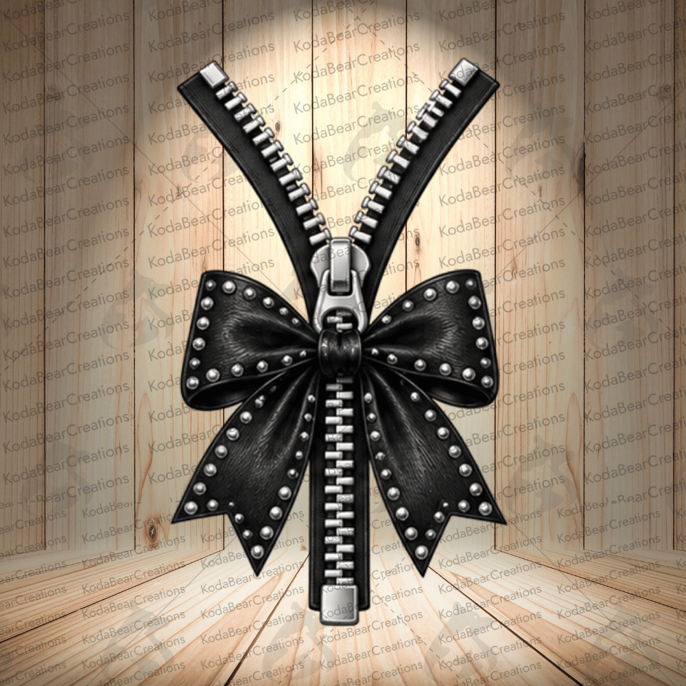 A black zipper with a large, decorative bow made of metal studs is displayed against a wooden background with the word "Kodabearcreations" repeated multiple times.